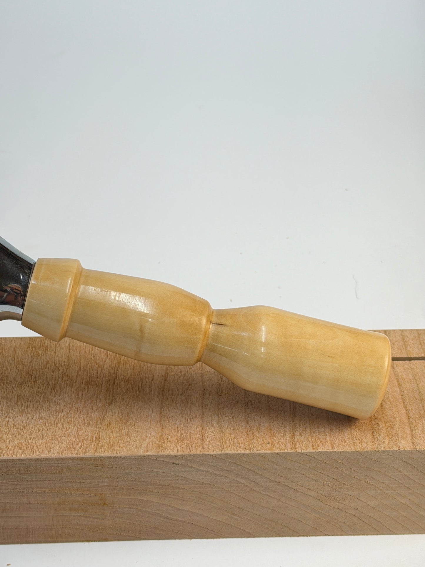 Bradford Pear Pizza Cutter — side view