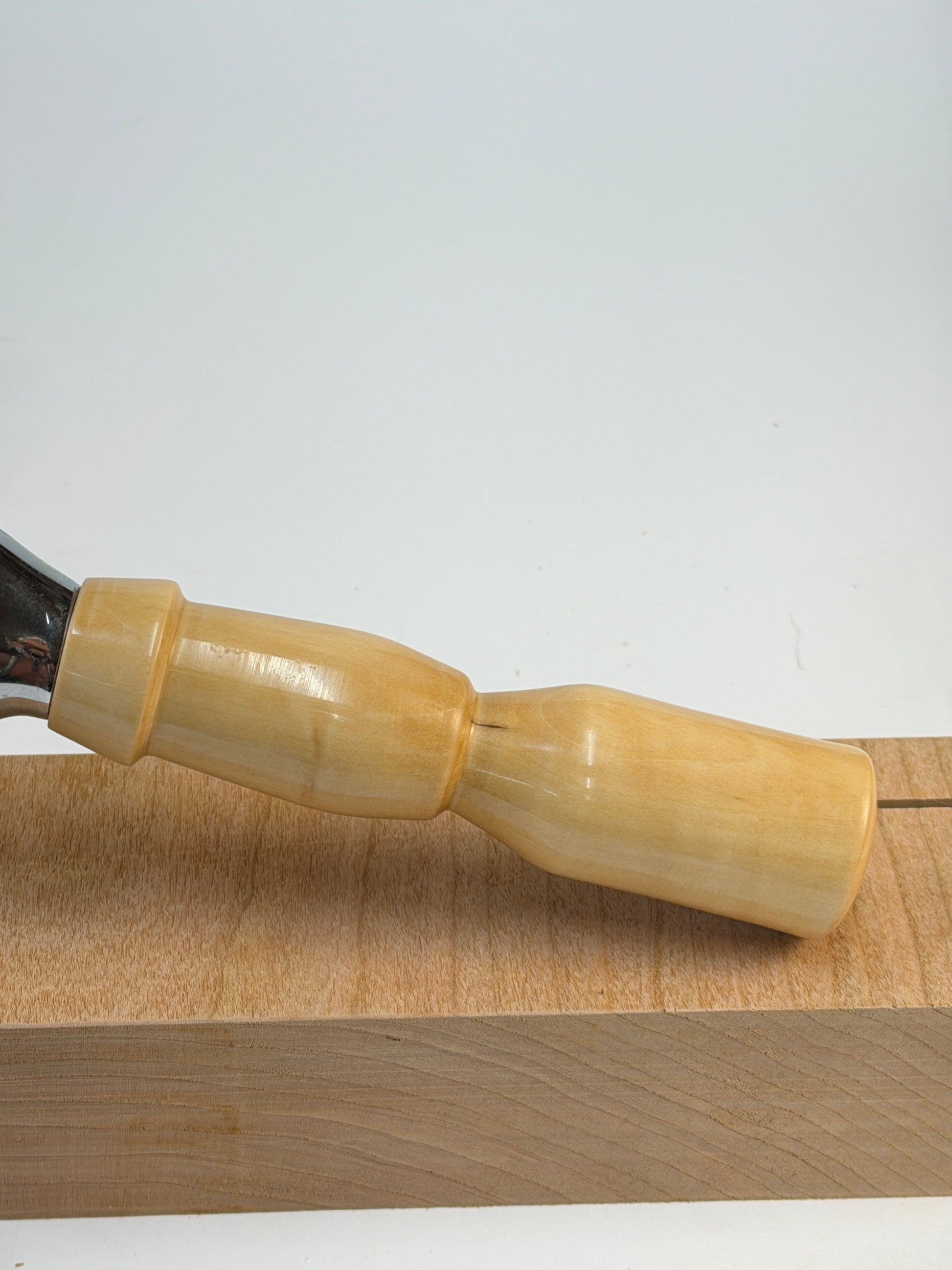 Bradford Pear Pizza Cutter — side view