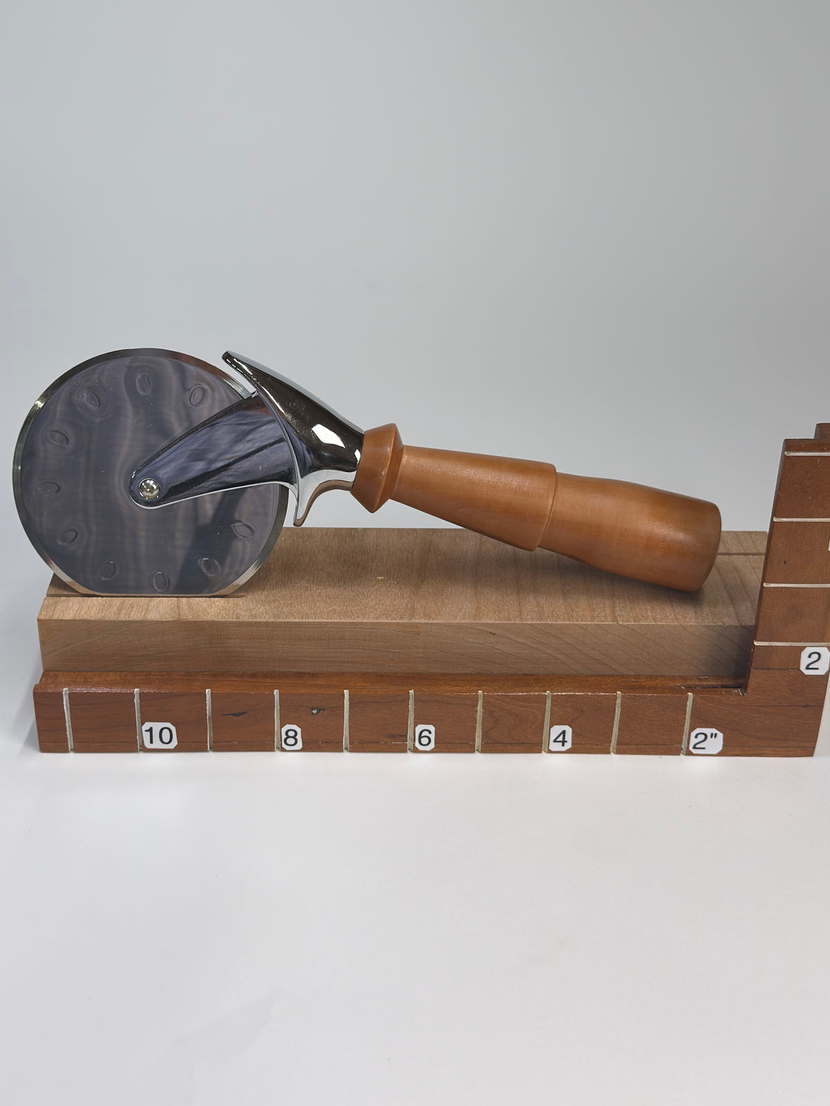 Cherry Pizza Cutter – 10.25" — shown with scale reference